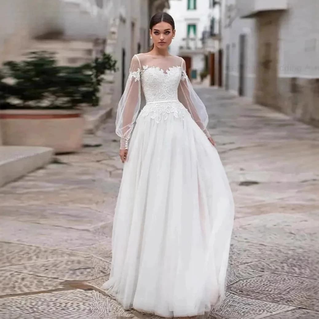 Elegant Mesh Strapless Wedding Gown — image 1